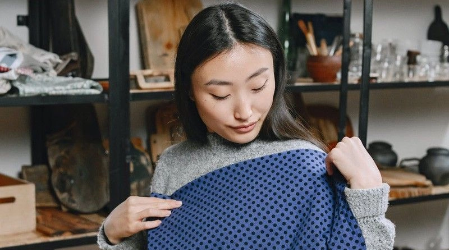 Customer holding fabric swatch